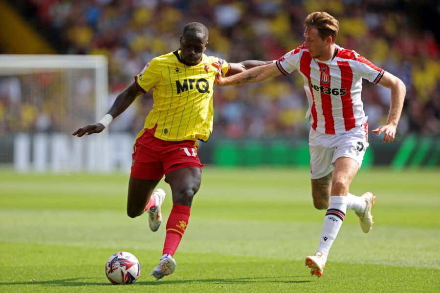 watford man moussa sissoko and stoke city midfielder wouter burger