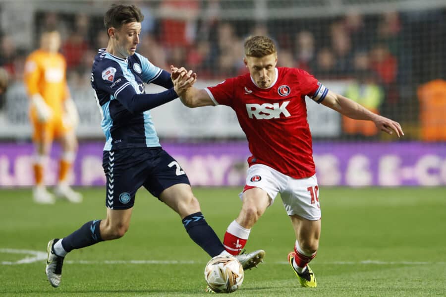 Charlton Athletic's Greg Docherty in action with Wycombe Wanderers' Cameron Humphreys