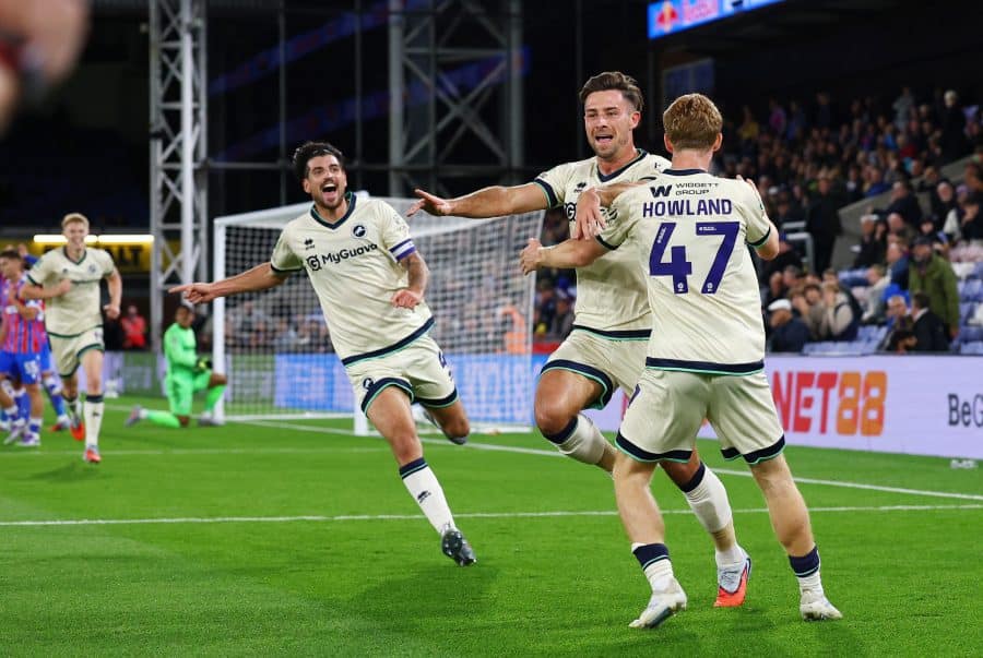 Millwall's Ryan Leonard celebrates scoring their first goal with teammates