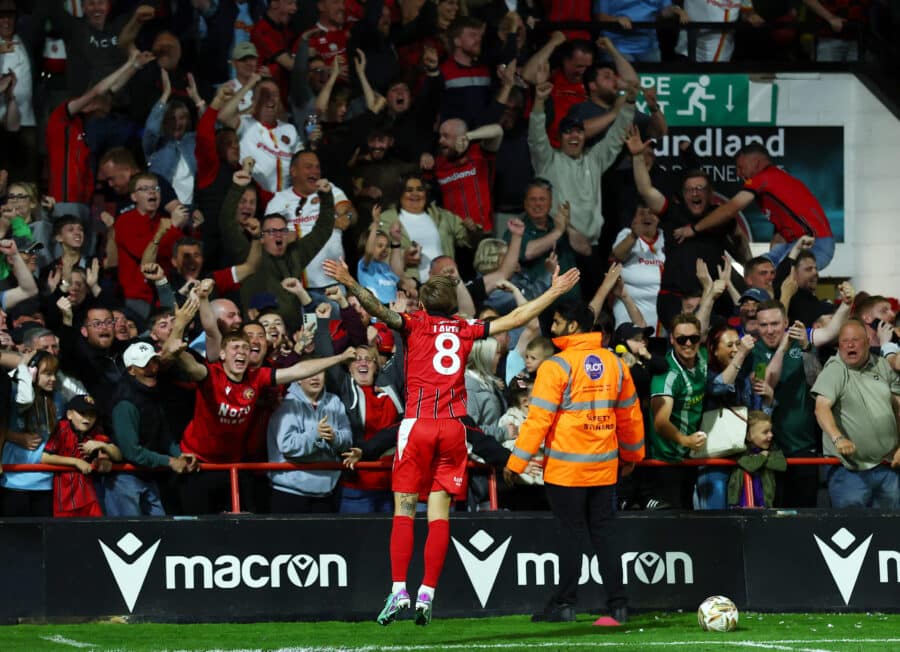 Walsall's Charlie Lakin celebrates after Levi Amantchi scores their second goal