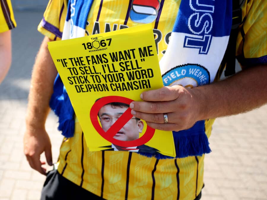 SWFC - Sheffield Wednesday fan with leaflets in protest to the owner Dejphon Chansiri outside the stadium before the match