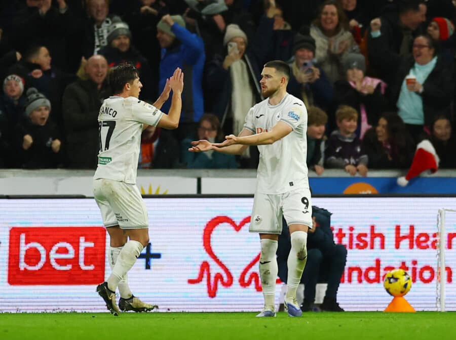 Swansea City's Zan Vipotnik celebrates his first goal with Swansea City's Goncalo Franco